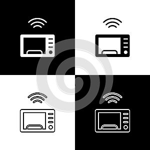 Set Smart microwave oven system icon isolated on black and white background. Home appliances icon. Internet of things