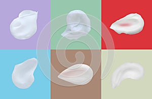 Set with smears of body creams on different color backgrounds