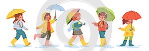 Set of smiling children walking under umbrella