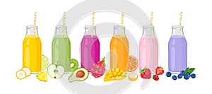 Set of smoothies in glass bottles with straw, fresh berry and fruits.
