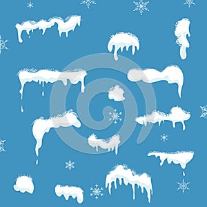 Set of Snow elements, Snow caps, snowballs and snowdrifts with falling snowflakes isolated on blue background for design and decor photo