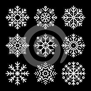 Set of snowflake icons isolated on black background. Snow icons silhouette, winter, New year and Christmas decoration elements.