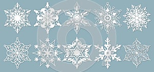 Set of snowflakes. Laser cut pattern for christmas paper cards, design elements, scrapbooking. Vector illustration photo