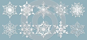 Set of snowflakes. Laser cut pattern for christmas paper cards, design elements, scrapbooking. Vector illustration