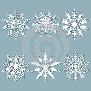 Set of snowflakes. Laser cut pattern for christmas paper cards, design elements, scrapbooking. Vector illustration