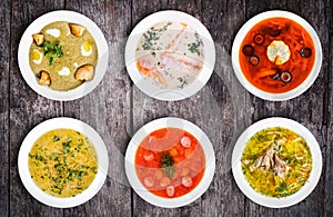 Set of soups. Cream soup with mushrooms, asian fish soup, solyanka, russian borscht, chicken soup, isolated on white.