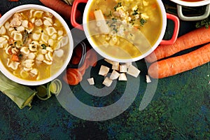 Set of soups from worldwide cuisines, healthy food. Broth with noodles, beef soup and broth with marrow dumplings. All soups with