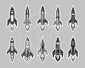 Set of space rockets and shuttles. Icons, stickers. Black and white silhouettes.