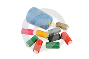 Set of spools of sewing thread isolated on white