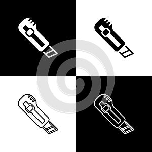 Set Stationery knife icon isolated on black and white background. Office paper cutter. Vector