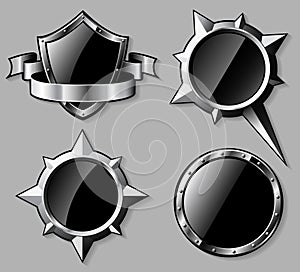 Set of steel glossy shields and compass roses