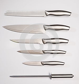 Set of steel kitchen knives, isolated on white background with clipping path. Chef knife