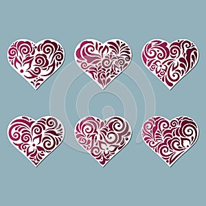 Set stencil hearts with patterns of leaves and flowers. Template for interior design  invitations  etc. Vector illustration.