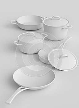 Set of stewpot, frying pan and chrome plated cookware on monochrome background