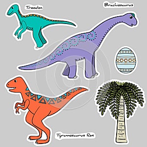 Set of stickers stylized dinosaurs, egg, tree photo