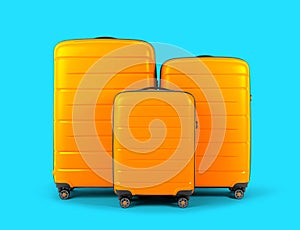 Set of stylish plastic yellow suitcases for travel on blue background.