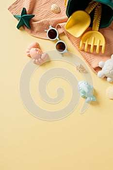 Set of stylish sand beach toys on pastel beige background. Summer, vacation concept