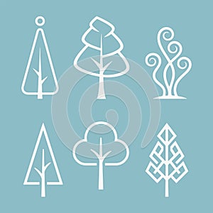 A Set of stylized tree silhouettes. each with a different shape and size