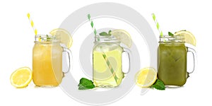 Set of summer iced green teas in mason jar glasses isolated on white