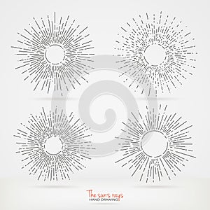 Set of sun rays images in Hand Drawing style. Graphic elements for various design projects. Uneven sun rays that diverge in hand.