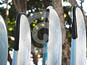 Set of surf boards in a stack