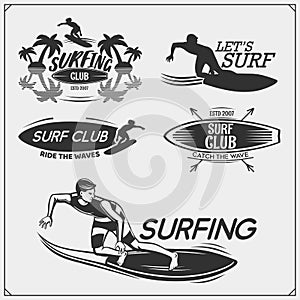 Set of surfing emblems, labels and badges. Surf design elements.
