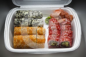 Set of sushi rolls on carrying out