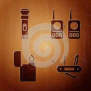 Set Swiss army knife, Flashlight, Lighter and Walkie talkie on wooden background. Vector