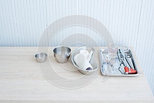 Set of syringe and surgical object on tablet on white background. Medical equipment