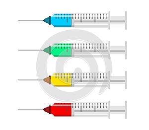 Set of syringes with different fluids and medications.