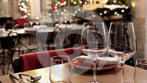 Set table decorated with Christmas lights