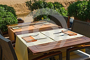 Set tables at outside dining area