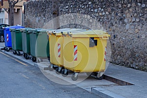A set of tanks for the selective collection of waste (metal, glass, paper and plastic), for recycling purposes