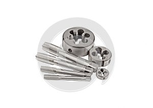 Set of taps and dies for threading on a white background