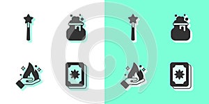 Set Tarot cards, Magic wand, Hand holding fire and Witch cauldron icon. Vector