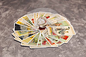 Set of tarot cards on the table. Tarot cards and magic crystal ball.