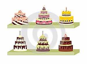 Set of tasty cakes on the shelf for birthdays, weddings, anniversaries and other celebrations.
