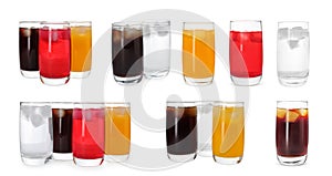 Set of tasty refreshing soda drinks with ice cubes on white background