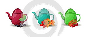 set of teapots with berries
