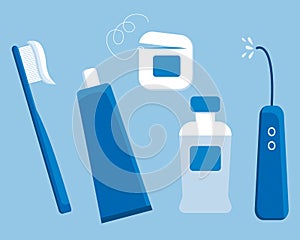 Set of teeth hygiene items: toothbrush, toothpaste, floss, oral flosser. and mouthwasher with sign DENTAL CARE. In blue