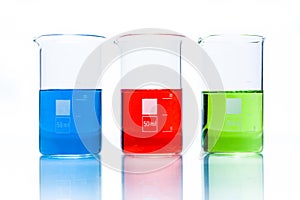 Set of temperature resistant cylindrical beakers with color liquid