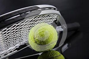 A set of tennis. Racket and ball.