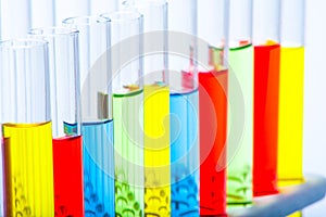 Set of test lab tubes with color liquid on stand