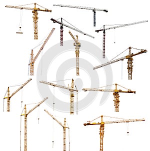 Set of thirteen hoisting cranes isolate on white photo