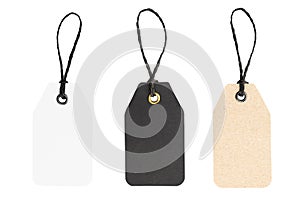 Set of three Blank cardboard price tags isolated on white background. White, black and brown colors