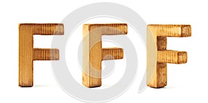 Set of three block wooden letters isolated