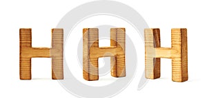 Set of three block wooden letters isolated