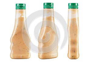 Set of three bottles of cream sauce. Isolated on white background