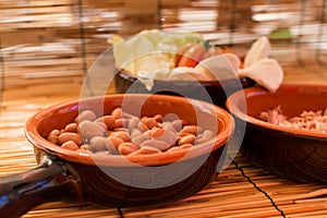 Set of three bowls with food