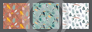 Set of three cute vector seamless pattern with leopard animals exotic birds, parrot, toucan and tropical plants.
